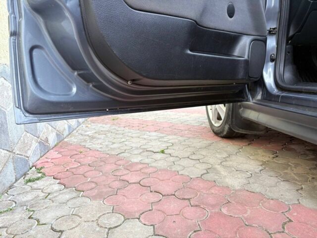 Серый Опель Астра, объемом двигателя 1.4 л и пробегом 201 тыс. км за 3600 $, фото 5 на Automoto.ua