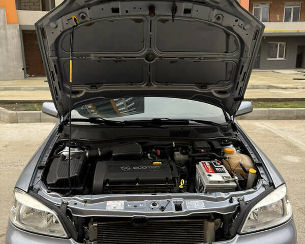 Серый Опель Астра, объемом двигателя 1.6 л и пробегом 113 тыс. км за 5500 $, фото 11 на Automoto.ua