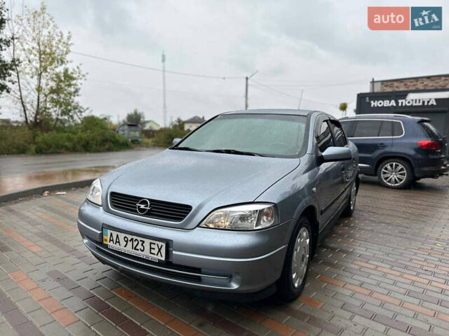 Серый Опель Астра, объемом двигателя 1.6 л и пробегом 28 тыс. км за 3999 $, фото 10 на Automoto.ua