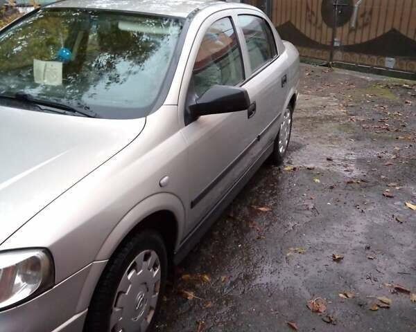 Серый Опель Астра, объемом двигателя 1.4 л и пробегом 119 тыс. км за 5000 $, фото 2 на Automoto.ua