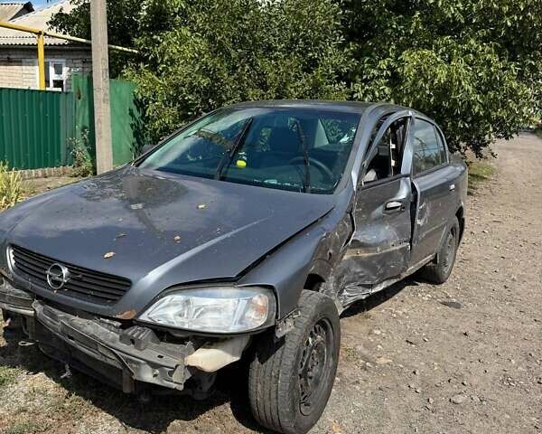 Серый Опель Астра, объемом двигателя 1.4 л и пробегом 122 тыс. км за 1500 $, фото 21 на Automoto.ua