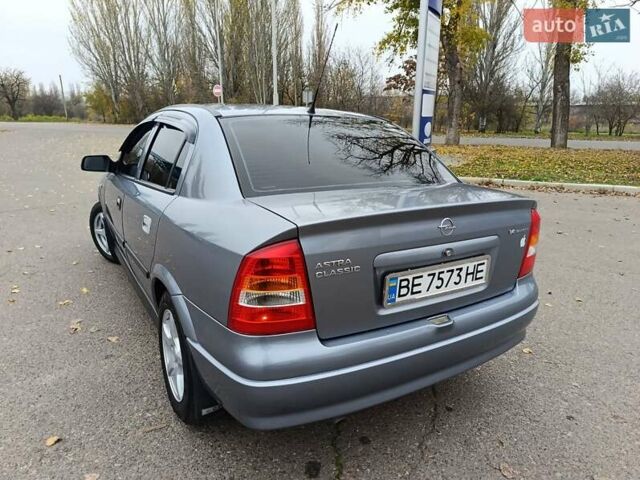Серый Опель Астра, объемом двигателя 1.4 л и пробегом 77 тыс. км за 4400 $, фото 4 на Automoto.ua