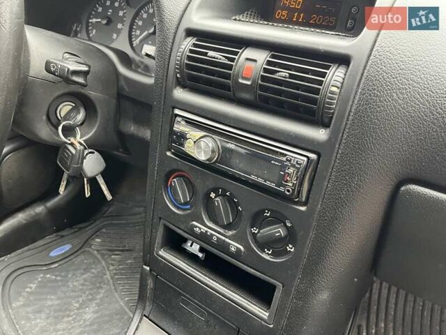 Сірий Опель Астра, об'ємом двигуна 1.4 л та пробігом 146 тис. км за 2950 $, фото 10 на Automoto.ua