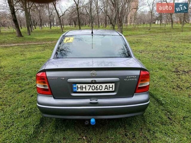 Серый Опель Астра, объемом двигателя 1.6 л и пробегом 247 тыс. км за 3950 $, фото 6 на Automoto.ua