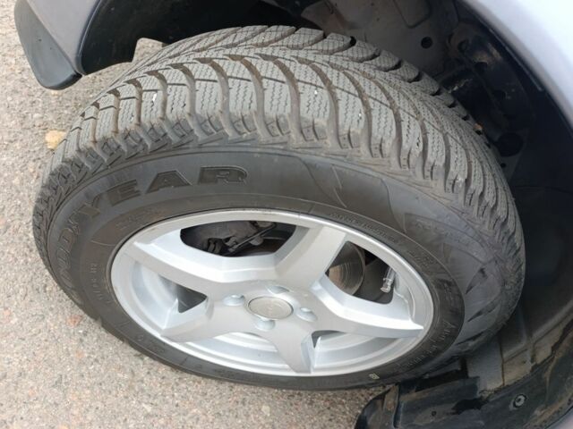 Серый Опель Астра, объемом двигателя 1.4 л и пробегом 77 тыс. км за 4400 $, фото 7 на Automoto.ua