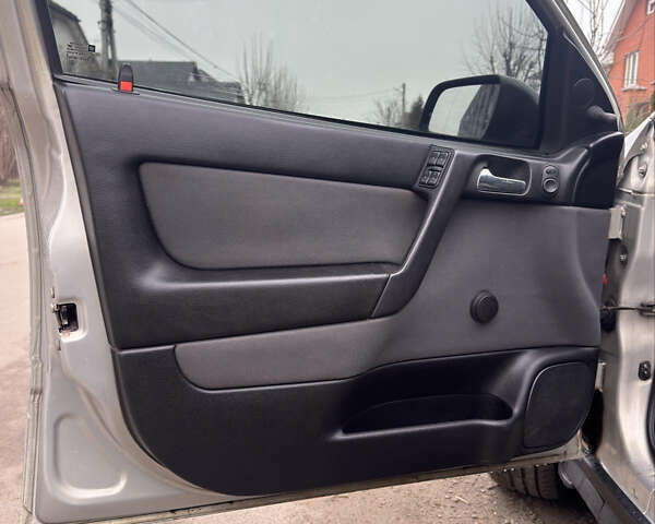 Сірий Опель Астра, об'ємом двигуна 1.4 л та пробігом 218 тис. км за 4000 $, фото 30 на Automoto.ua