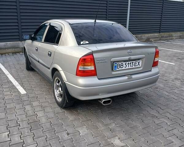 Серый Опель Астра, объемом двигателя 1.6 л и пробегом 98 тыс. км за 4500 $, фото 11 на Automoto.ua