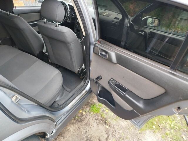 Серый Опель Астра, объемом двигателя 1.6 л и пробегом 256 тыс. км за 3500 $, фото 2 на Automoto.ua