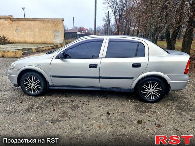 Серый Опель Астра, объемом двигателя 1.4 л и пробегом 183 тыс. км за 4200 $, фото 6 на Automoto.ua