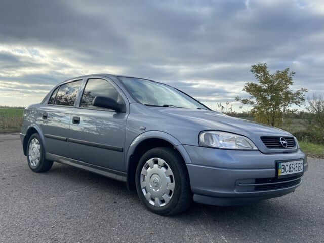 Серый Опель Астра, объемом двигателя 1.6 л и пробегом 200 тыс. км за 4200 $, фото 2 на Automoto.ua