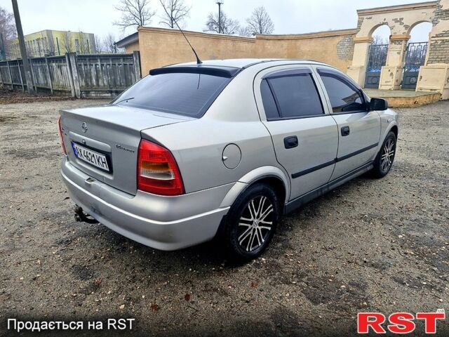 Серый Опель Астра, объемом двигателя 1.4 л и пробегом 183 тыс. км за 4200 $, фото 3 на Automoto.ua