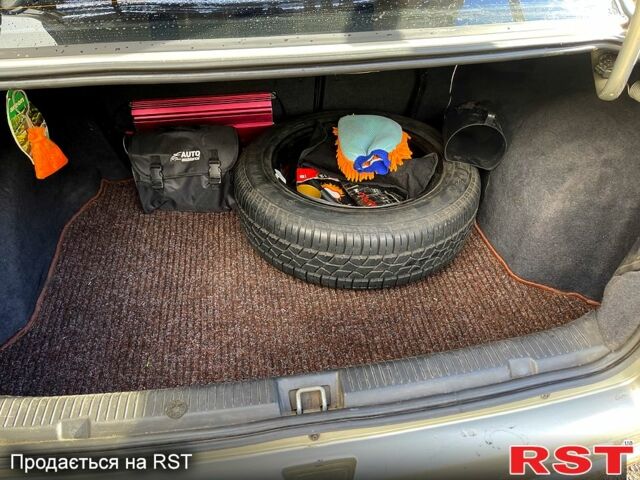 Серый Опель Астра, объемом двигателя 1.4 л и пробегом 326 тыс. км за 4200 $, фото 11 на Automoto.ua