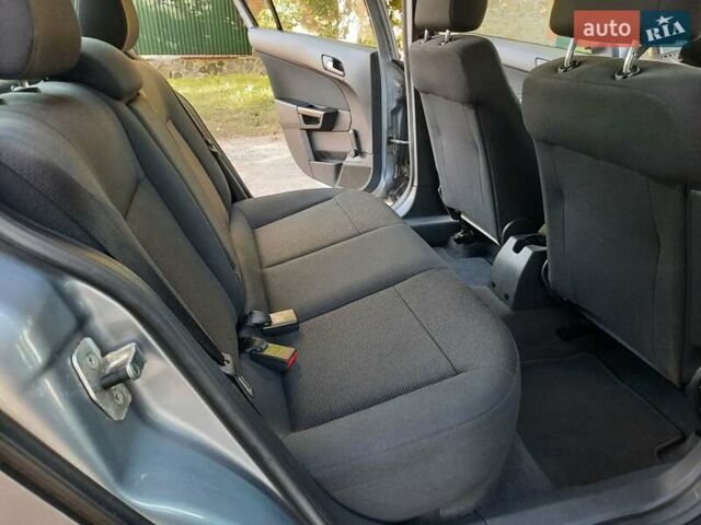 Серый Опель Астра, объемом двигателя 1.6 л и пробегом 117 тыс. км за 5550 $, фото 47 на Automoto.ua