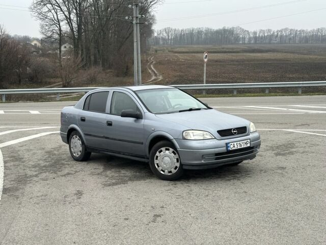 Серый Опель Астра, объемом двигателя 1.4 л и пробегом 137 тыс. км за 2850 $, фото 1 на Automoto.ua