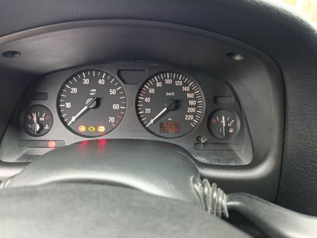 Серый Опель Астра, объемом двигателя 1.4 л и пробегом 77 тыс. км за 4400 $, фото 10 на Automoto.ua