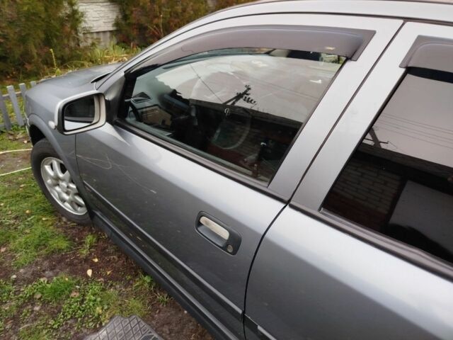 Серый Опель Астра, объемом двигателя 1.6 л и пробегом 256 тыс. км за 3500 $, фото 10 на Automoto.ua