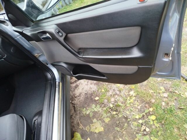 Серый Опель Астра, объемом двигателя 1.6 л и пробегом 256 тыс. км за 3500 $, фото 5 на Automoto.ua