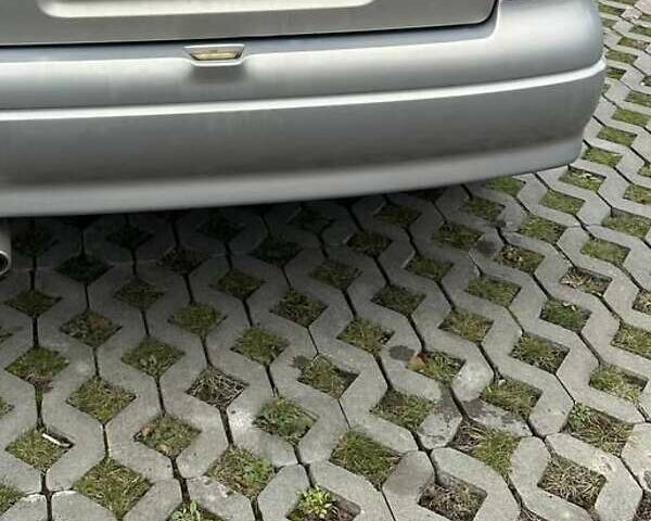 Серый Опель Астра, объемом двигателя 1.6 л и пробегом 179 тыс. км за 4000 $, фото 10 на Automoto.ua