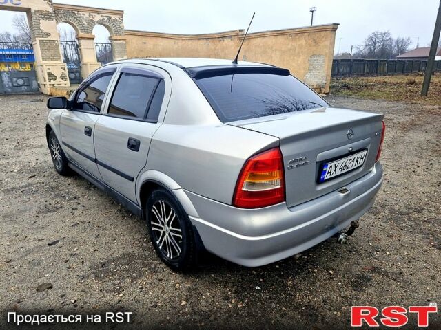 Серый Опель Астра, объемом двигателя 1.4 л и пробегом 183 тыс. км за 4200 $, фото 4 на Automoto.ua