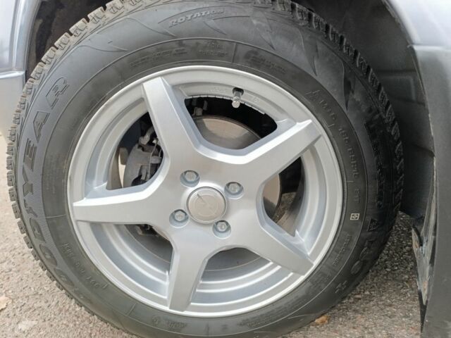 Серый Опель Астра, объемом двигателя 1.4 л и пробегом 77 тыс. км за 4400 $, фото 5 на Automoto.ua