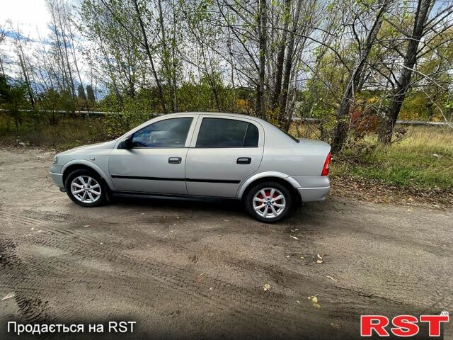 Серый Опель Астра, объемом двигателя 1.4 л и пробегом 326 тыс. км за 4200 $, фото 1 на Automoto.ua