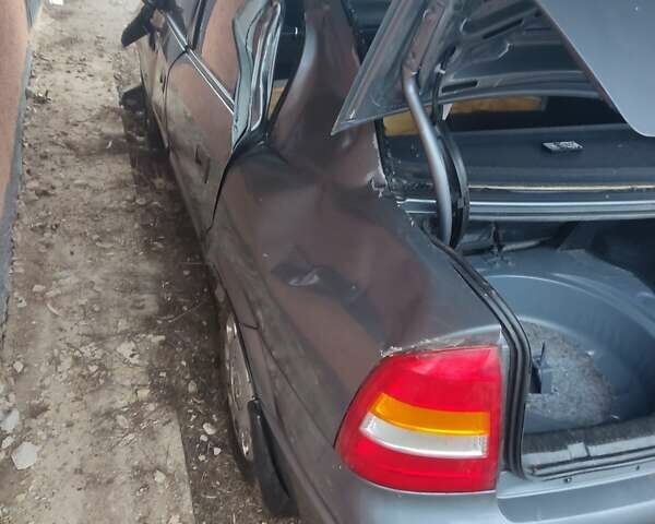 Серый Опель Астра, объемом двигателя 1.6 л и пробегом 200 тыс. км за 2000 $, фото 6 на Automoto.ua