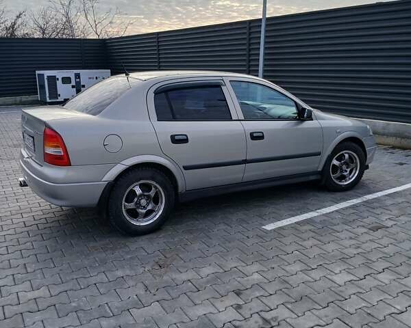 Серый Опель Астра, объемом двигателя 1.6 л и пробегом 98 тыс. км за 4500 $, фото 5 на Automoto.ua