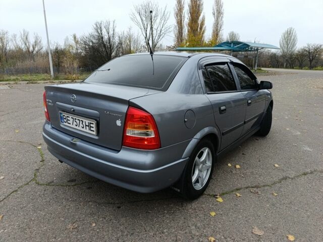 Серый Опель Астра, объемом двигателя 1.4 л и пробегом 77 тыс. км за 4400 $, фото 3 на Automoto.ua