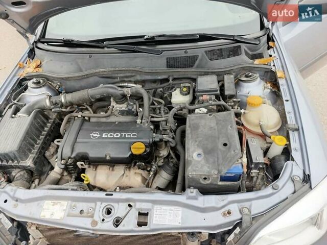 Серый Опель Астра, объемом двигателя 1.4 л и пробегом 77 тыс. км за 4400 $, фото 11 на Automoto.ua