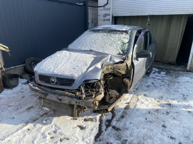 Серый Опель Астра, объемом двигателя 1.4 л и пробегом 250 тыс. км за 1299 $, фото 2 на Automoto.ua