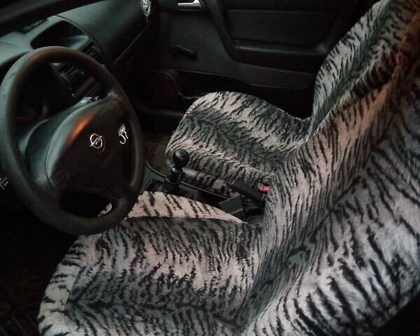 Серый Опель Астра, объемом двигателя 1.4 л и пробегом 119 тыс. км за 5000 $, фото 6 на Automoto.ua