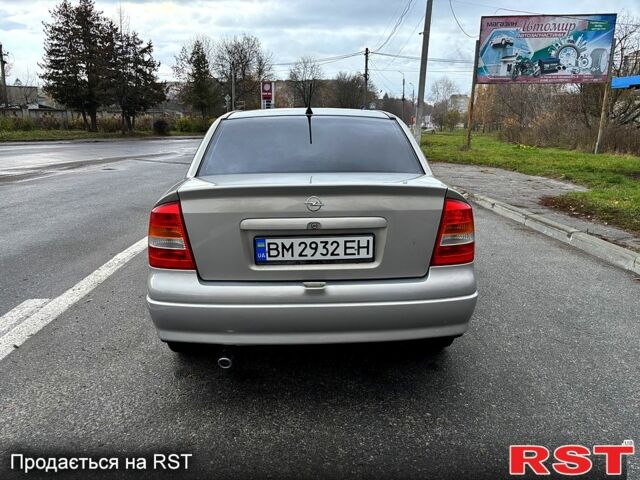 Серый Опель Астра, объемом двигателя 1.4 л и пробегом 201 тыс. км за 3450 $, фото 6 на Automoto.ua