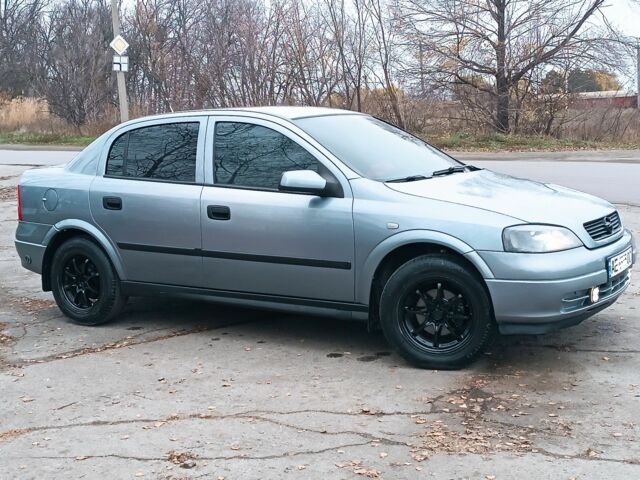 Серый Опель Астра, объемом двигателя 1 л и пробегом 400 тыс. км за 3500 $, фото 4 на Automoto.ua