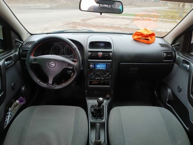 Серый Опель Астра, объемом двигателя 1 л и пробегом 400 тыс. км за 3500 $, фото 8 на Automoto.ua