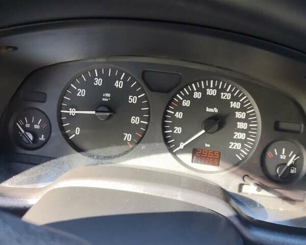 Серый Опель Астра, объемом двигателя 1.4 л и пробегом 213 тыс. км за 3700 $, фото 7 на Automoto.ua