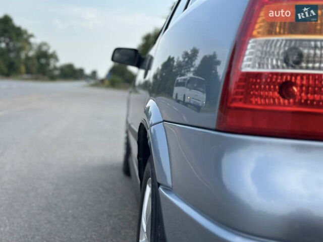 Сірий Опель Астра, об'ємом двигуна 1.6 л та пробігом 230 тис. км за 4300 $, фото 5 на Automoto.ua