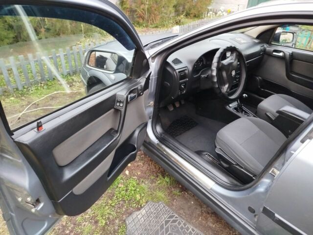 Серый Опель Астра, объемом двигателя 1.6 л и пробегом 256 тыс. км за 3500 $, фото 8 на Automoto.ua