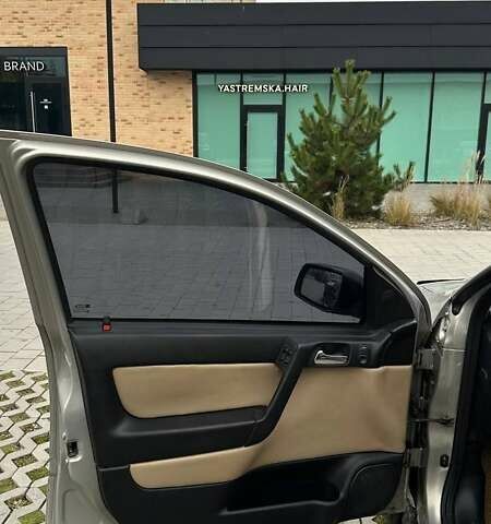 Серый Опель Астра, объемом двигателя 1.6 л и пробегом 179 тыс. км за 4000 $, фото 18 на Automoto.ua