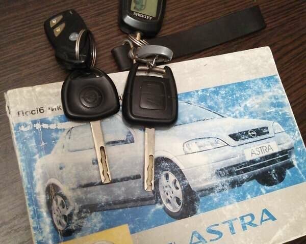Опель Астра 2008 у Червоноград на Automoto.ua Сірий Опель Астра, об'ємом двигуна 1.6 л та пробігом 193 тис. км за 5300 $, фото 26 на Automoto.ua