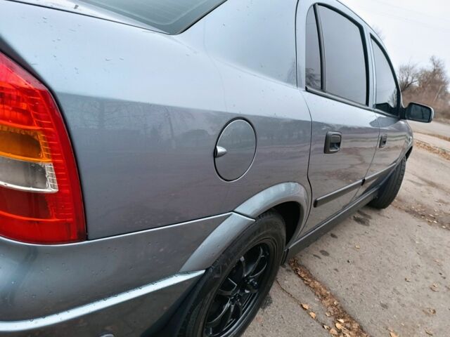 Серый Опель Астра, объемом двигателя 1 л и пробегом 400 тыс. км за 3500 $, фото 11 на Automoto.ua