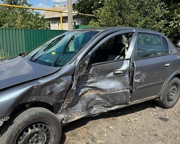 Серый Опель Астра, объемом двигателя 1.4 л и пробегом 122 тыс. км за 1500 $, фото 7 на Automoto.ua