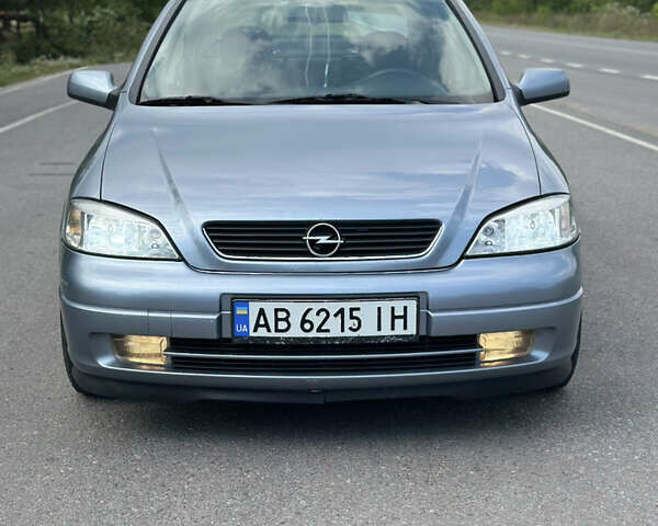 Серый Опель Астра, объемом двигателя 1.6 л и пробегом 230 тыс. км за 4600 $, фото 3 на Automoto.ua
