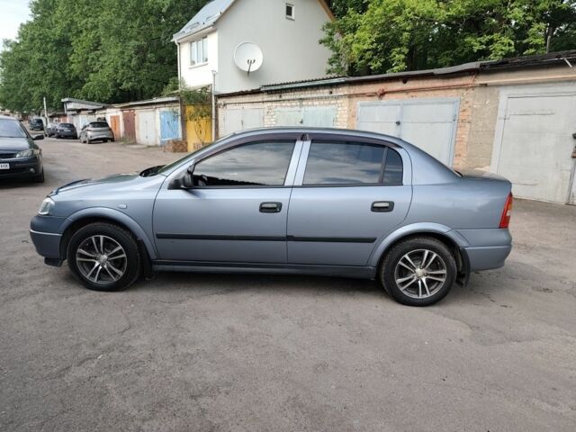 Серый Опель Астра, объемом двигателя 1.4 л и пробегом 73 тыс. км за 5200 $, фото 5 на Automoto.ua