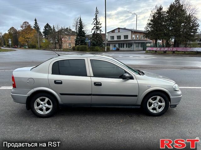 Серый Опель Астра, объемом двигателя 1.4 л и пробегом 201 тыс. км за 3450 $, фото 8 на Automoto.ua