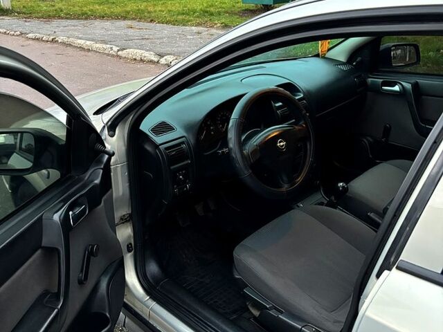 Серый Опель Астра, объемом двигателя 1.4 л и пробегом 201 тыс. км за 3450 $, фото 9 на Automoto.ua