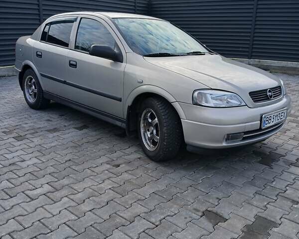 Серый Опель Астра, объемом двигателя 1.6 л и пробегом 98 тыс. км за 4500 $, фото 3 на Automoto.ua