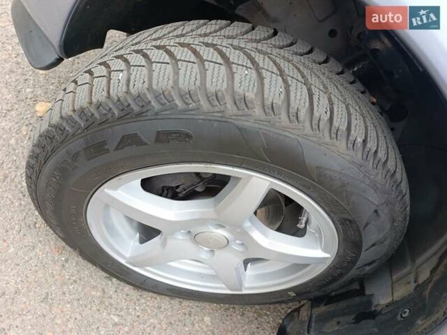 Серый Опель Астра, объемом двигателя 1.4 л и пробегом 77 тыс. км за 4400 $, фото 8 на Automoto.ua