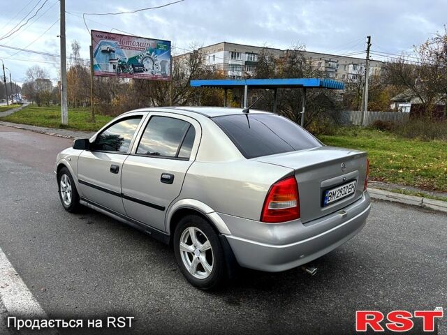 Серый Опель Астра, объемом двигателя 1.4 л и пробегом 201 тыс. км за 3450 $, фото 7 на Automoto.ua