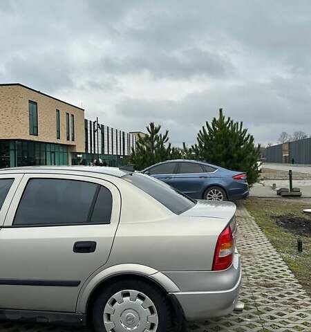 Серый Опель Астра, объемом двигателя 1.6 л и пробегом 179 тыс. км за 4000 $, фото 8 на Automoto.ua