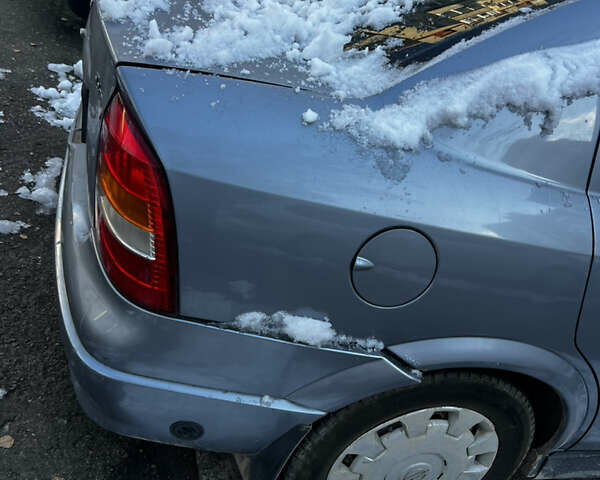 Сірий Опель Астра, об'ємом двигуна 1.4 л та пробігом 236 тис. км за 3500 $, фото 1 на Automoto.ua